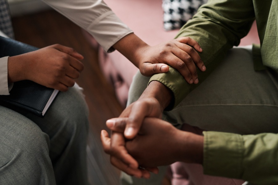 addiction-treatment-california counselor giving emotional support to client in addiction therapy