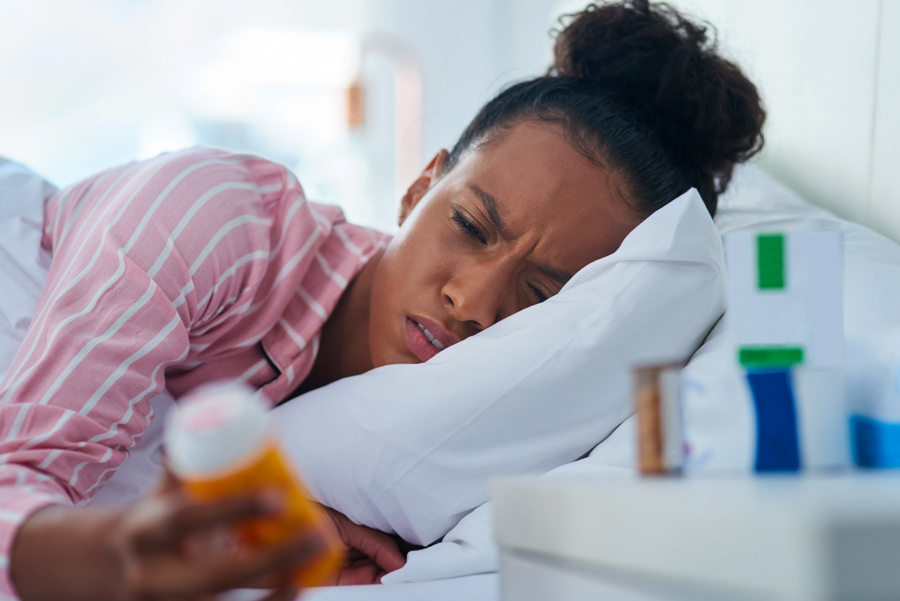 black woman battling prescription drug abuse and in need of addiction treatment